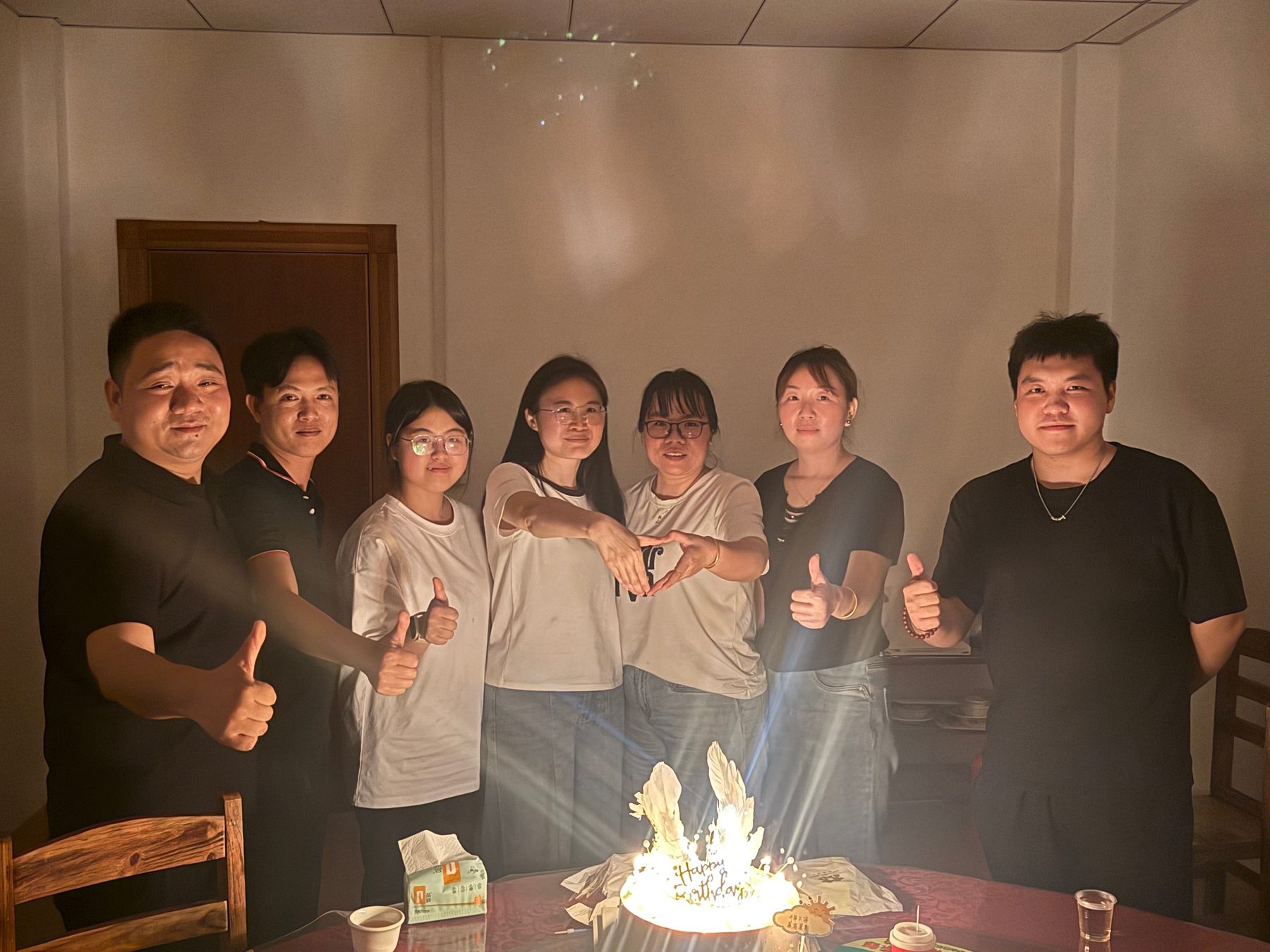 Junmei colleagues celebrating a team birthday