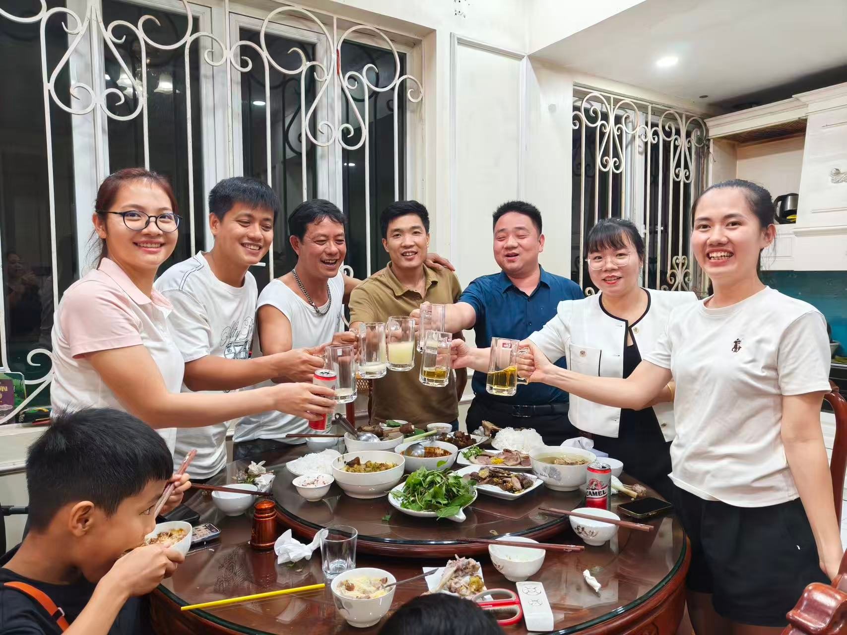 Junmei colleagues sharing a team dinner