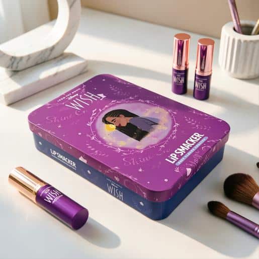 Purple rectangular Lip Smacker beauty tin shown with lip products