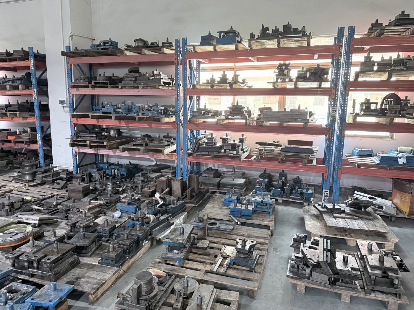 Real mold and tooling storage inside Junmei's tin box factory