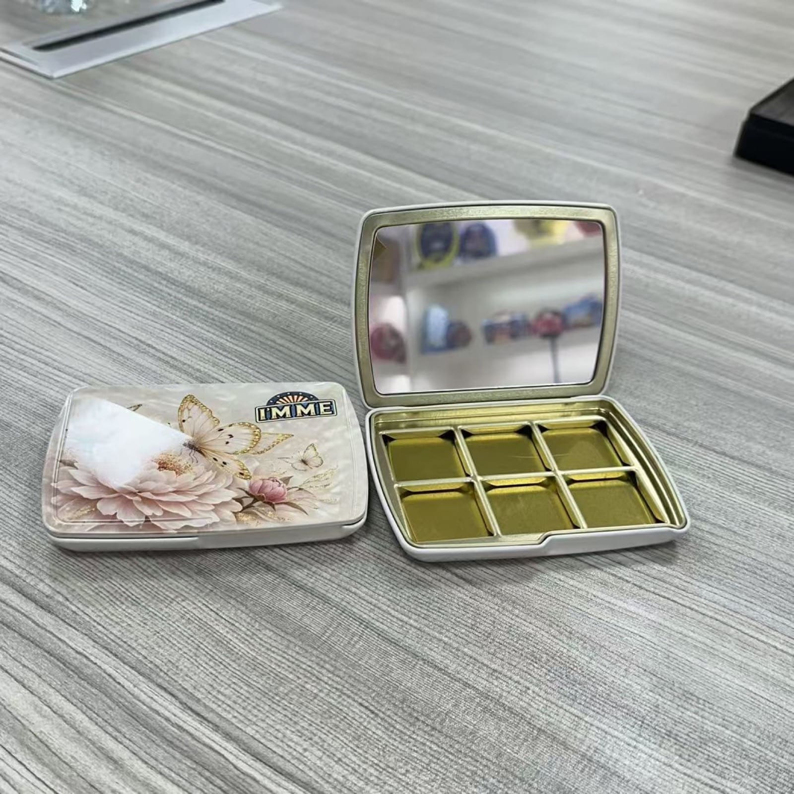 Finished pink custom tin produced by Junmei from the approved artwork