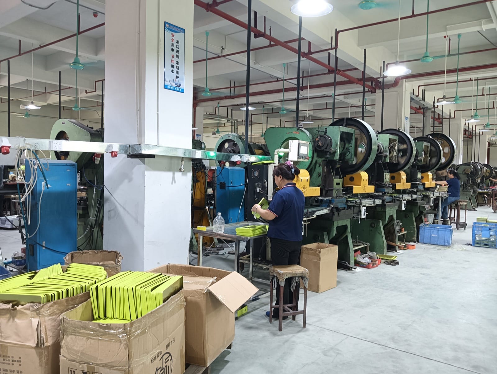 Real press forming workshop inside the Junmei tin box factory